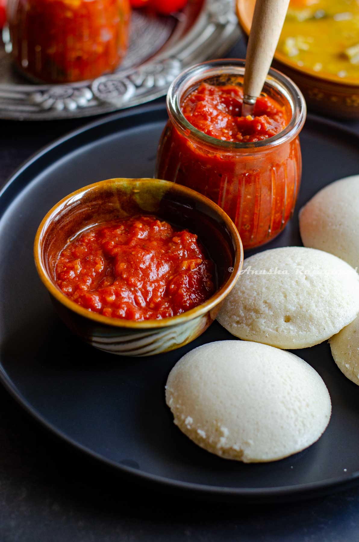 South Indian thakkali thokku- a tangy tomato relish served with soft idli