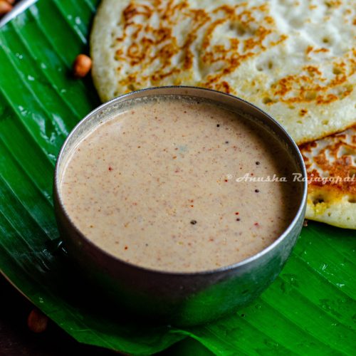 Palli chutney for dosa- vegan peanut chutney served with dosas on a banana leaf