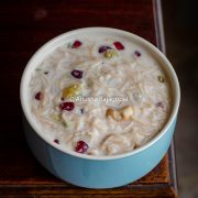 curd semiya served in a blue bowl placed on a wooden table