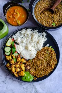 Instant pot whole masoor dal served with airfryer cauliflower and steamed rice