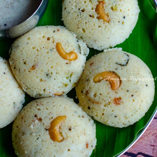 rava idli- steamed semolina savory cakes served on a plantain leaf