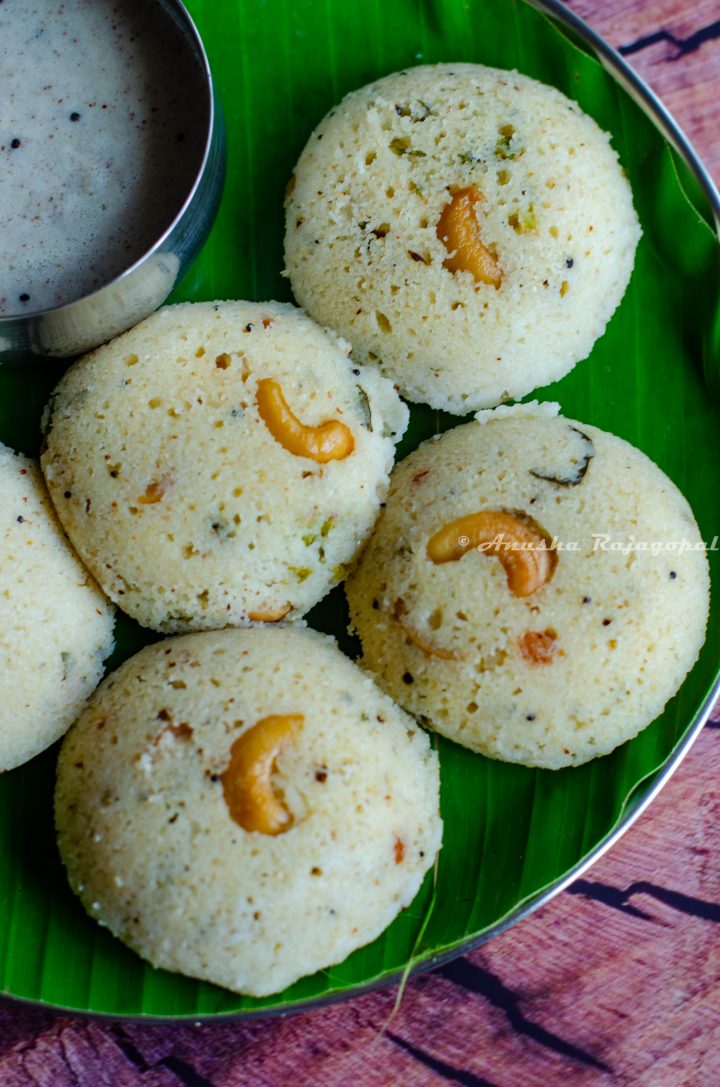 rava idli- steamed semolina savory cakes served on a plantain leaf