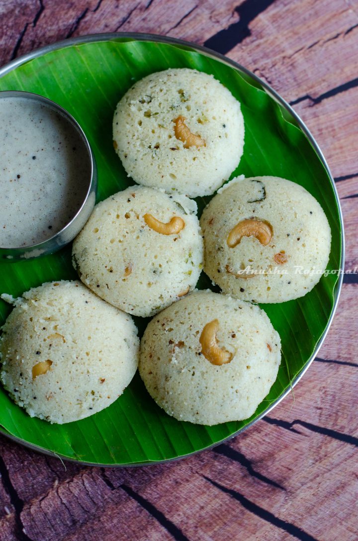 rava idli- steamed semolina savory cakes served on a plantain leaf