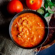 Tomato kurma, a south Indian curry served in a black bowl