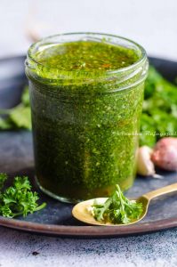 cilantro chimichurri in a glass jar