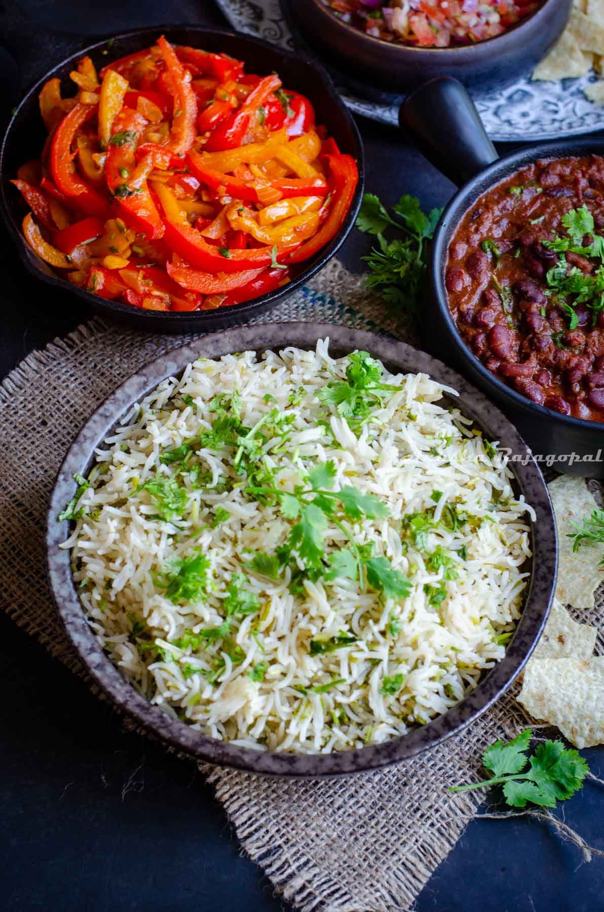 cilantro lime rice and other trimmings for a mexican burrito bowl on display