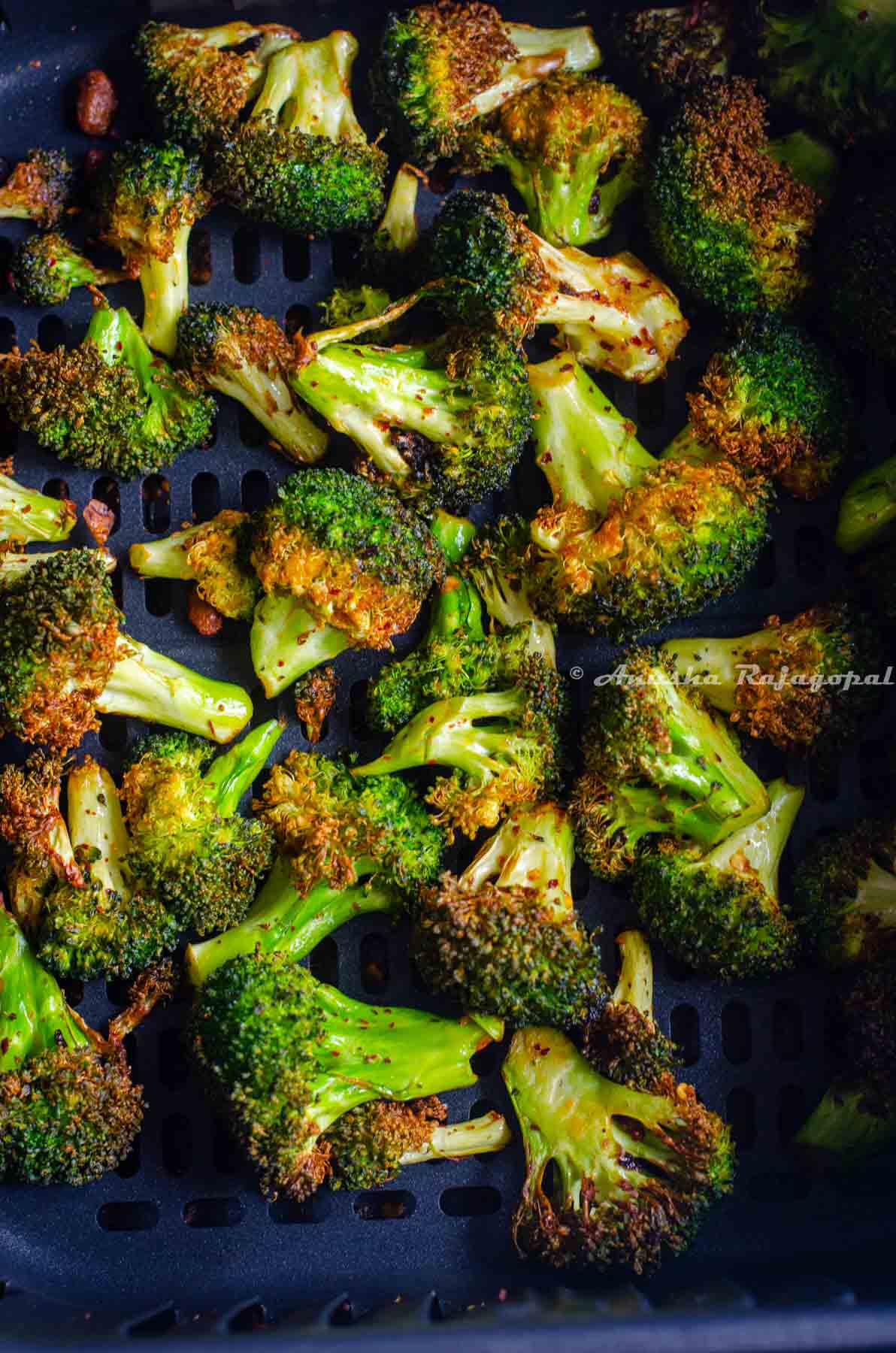 broccoli tossed with chili crisp air fried till crisp
