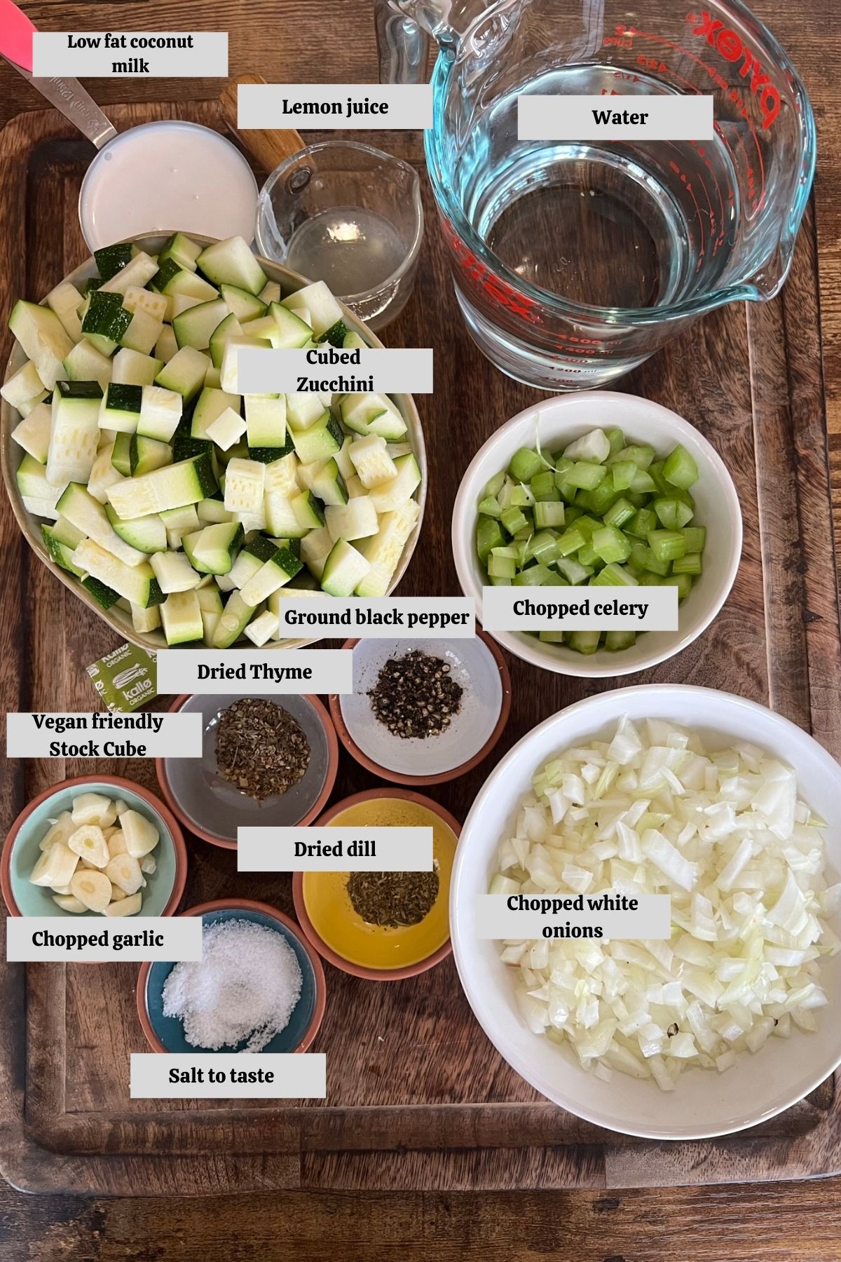 A display of ingredients needed to make vegan zucchini soup