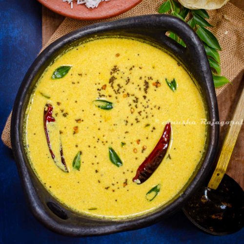 Kerala style mango curry in a yogurt base served in a blackened claypot. Served alongside steamed rice, poppadoms