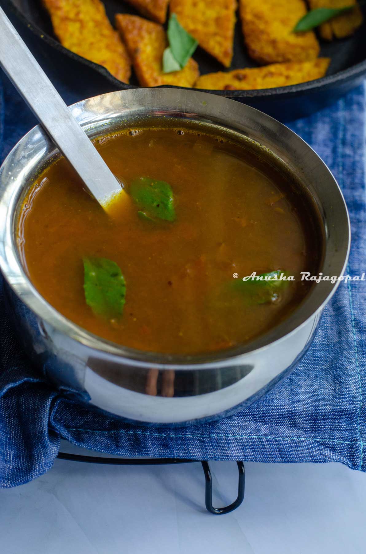 South-Indian-Tomato-Rasam-served-in-a-steel -bowl.
