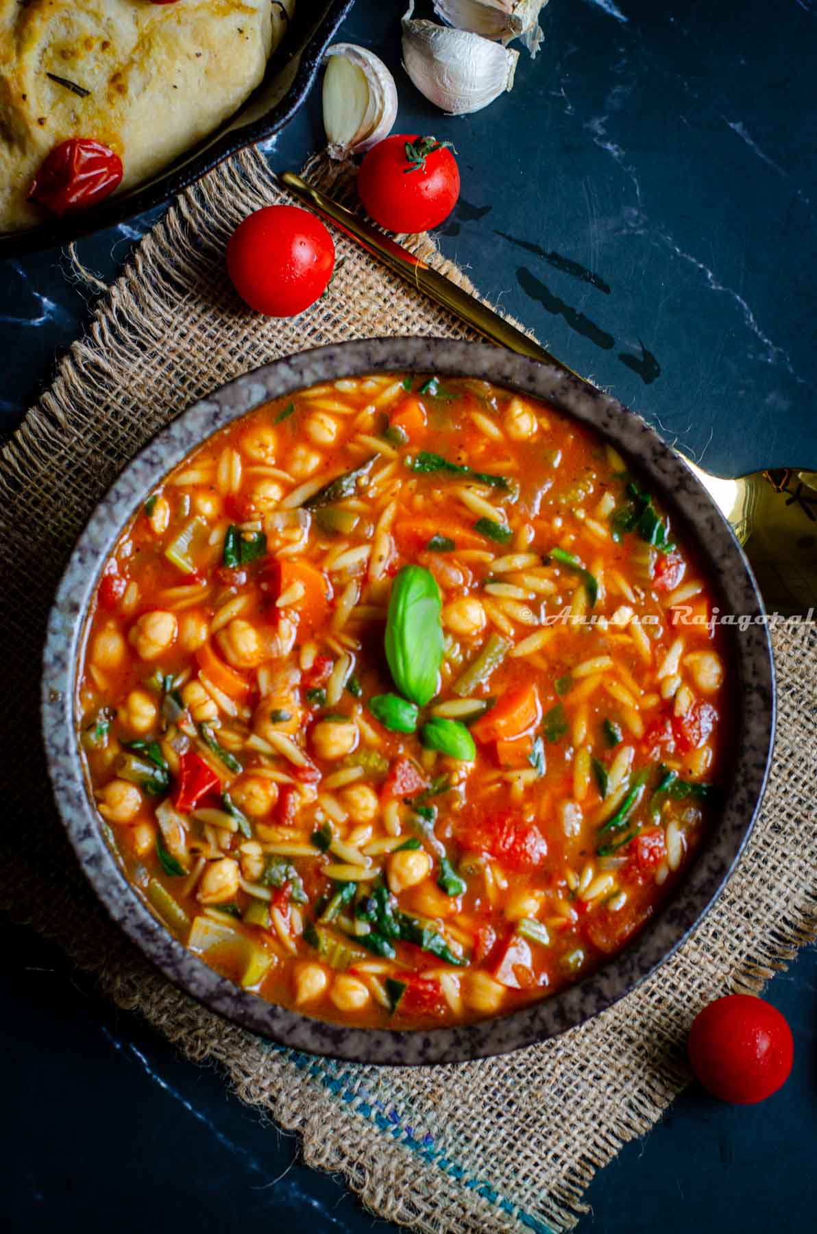 a-bowl-of-soup-made-with-canned-ganrbanzo-beans-and-orzo