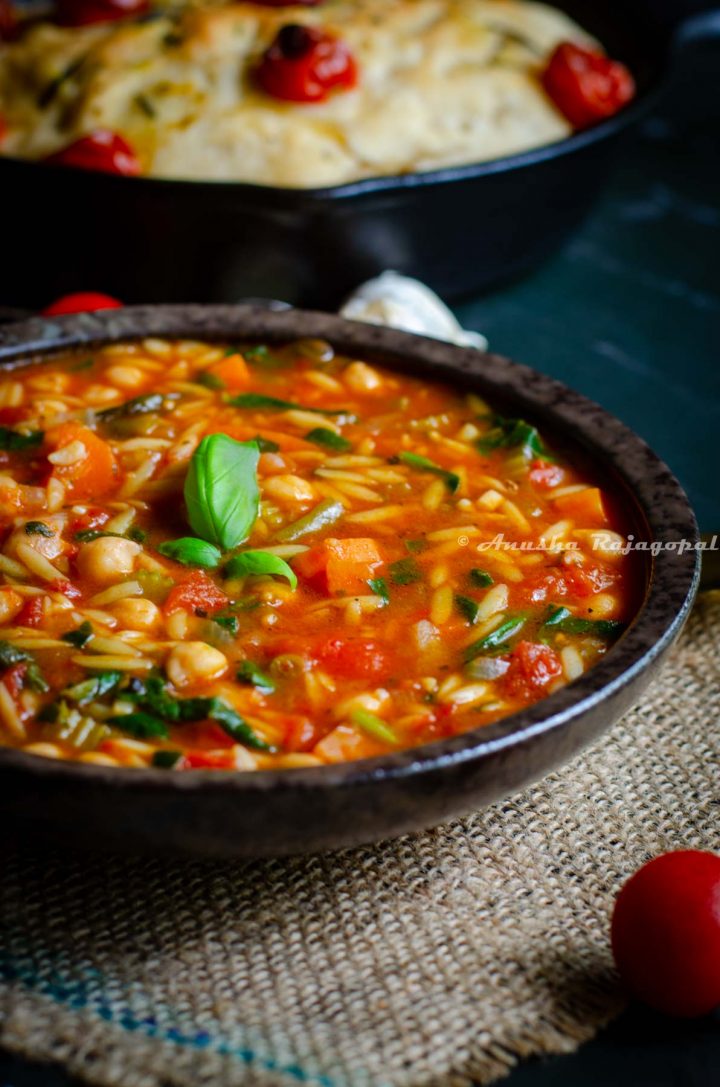 a-bowl-of-delicious-Italian-vegan-chickpea-soup-placed-over-a-burlap-mat