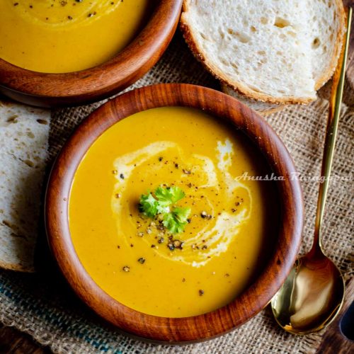 creamy-vegan-pumpkin-soup-with-a-swirl-of-coconut-milk