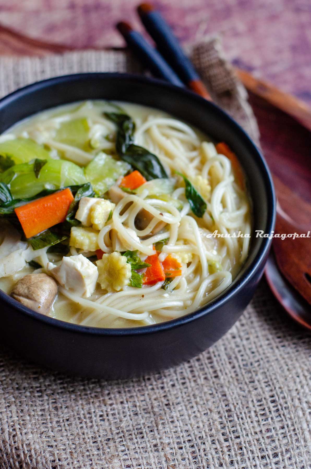 A bowl of delicious Thai coconut noodle soup