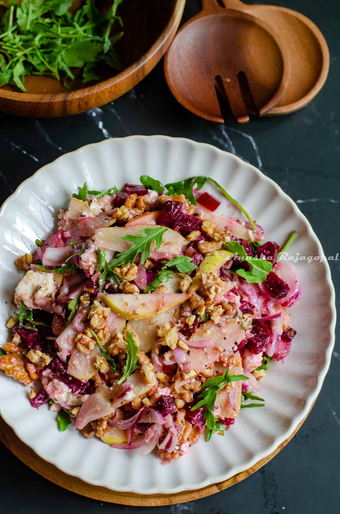 a plate of beet and feta cheese salad