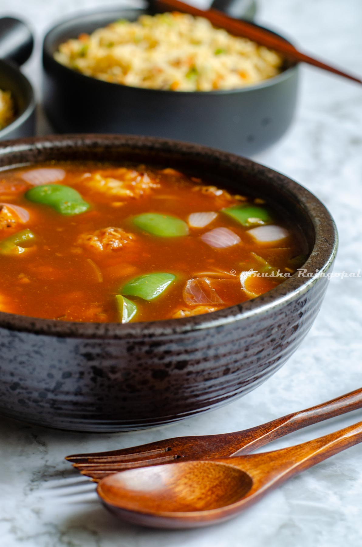 vegetable manchurian in gravy served with fried rice