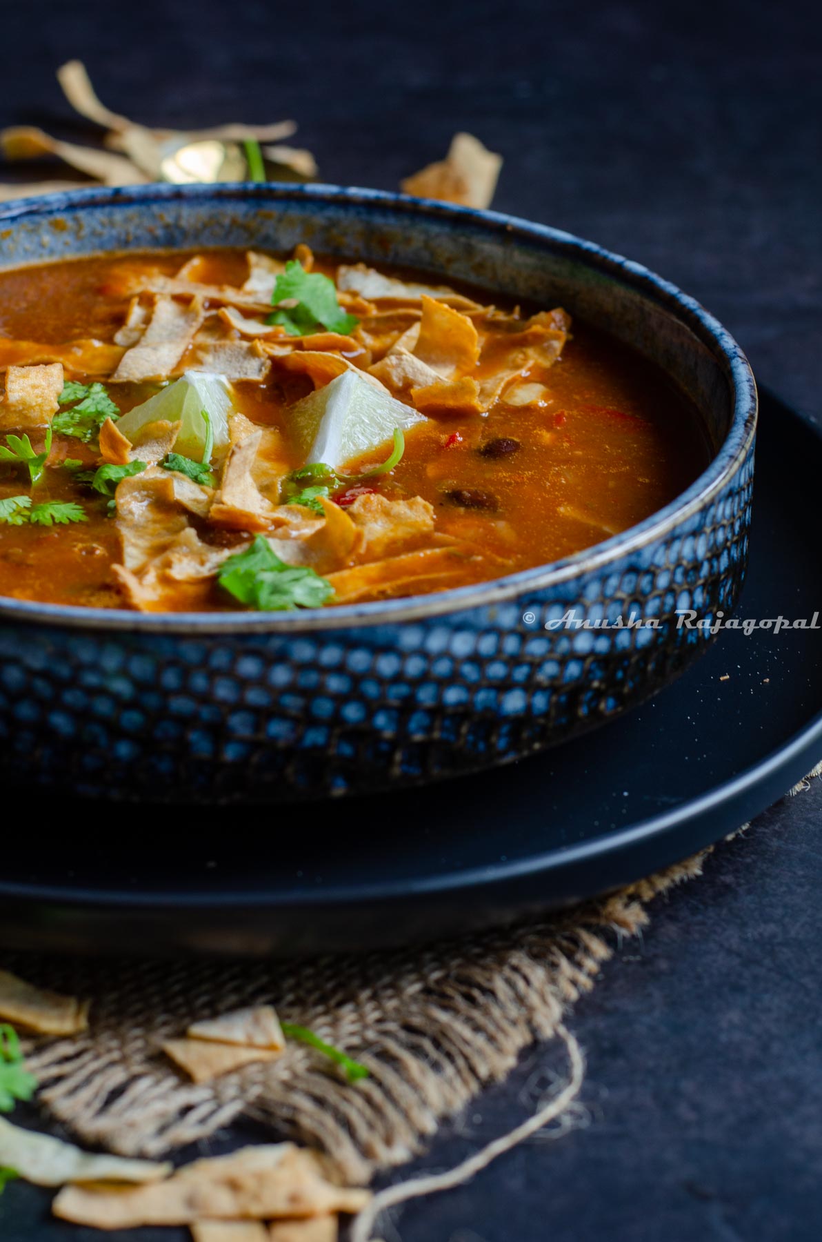 Vegan tortilla soup with black beans and corn