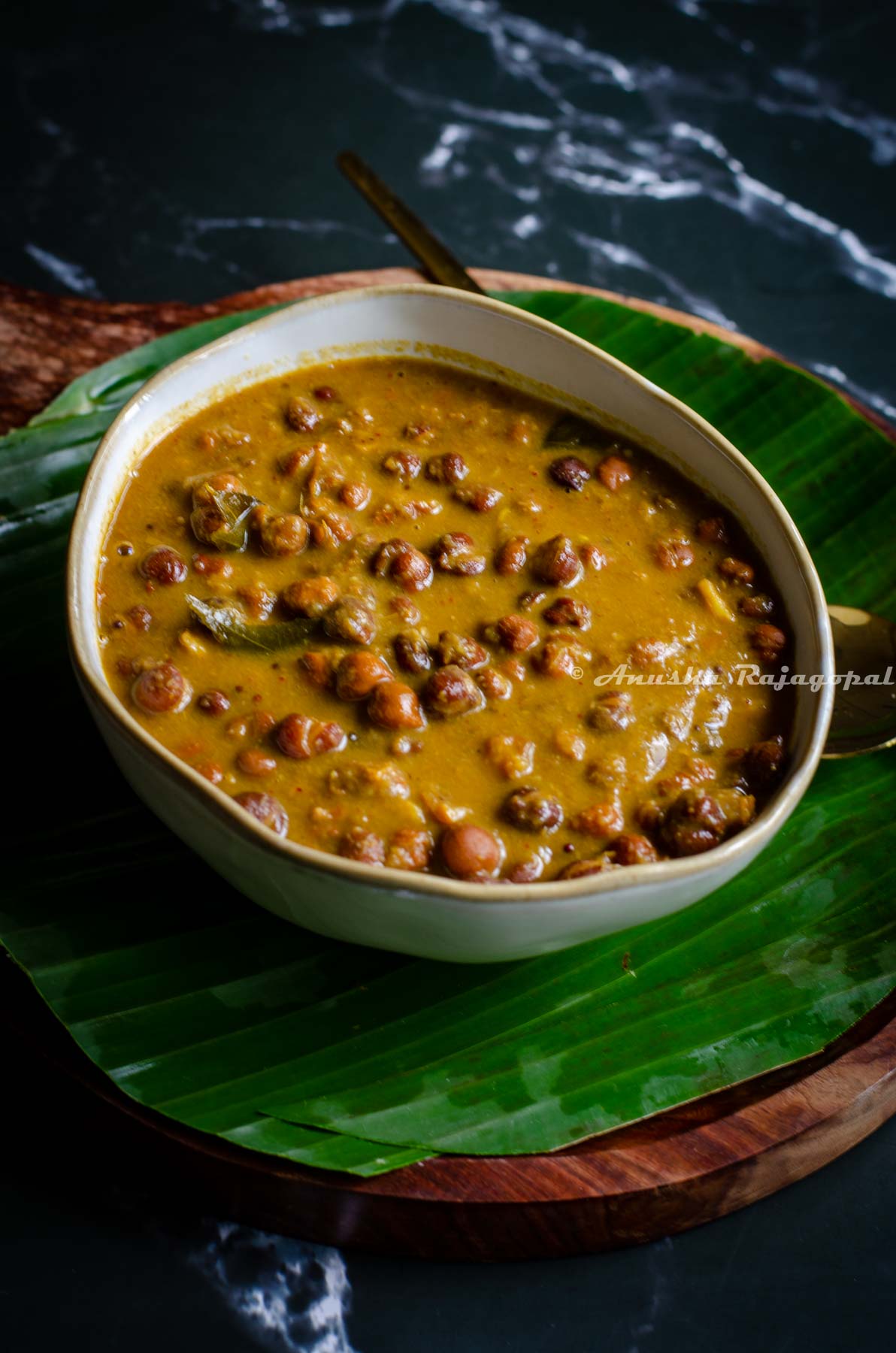 Kerala Kadala Curry; a brown chickpea curry served in a bowl